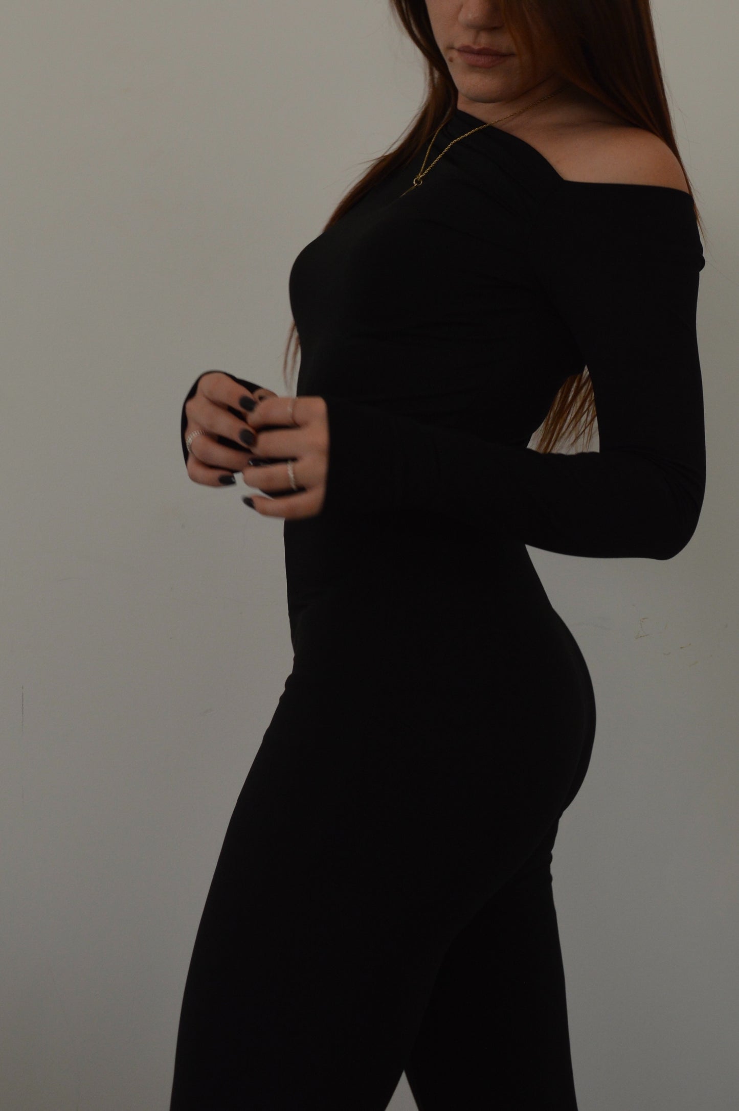 Tuta aderente con maniche lunghe