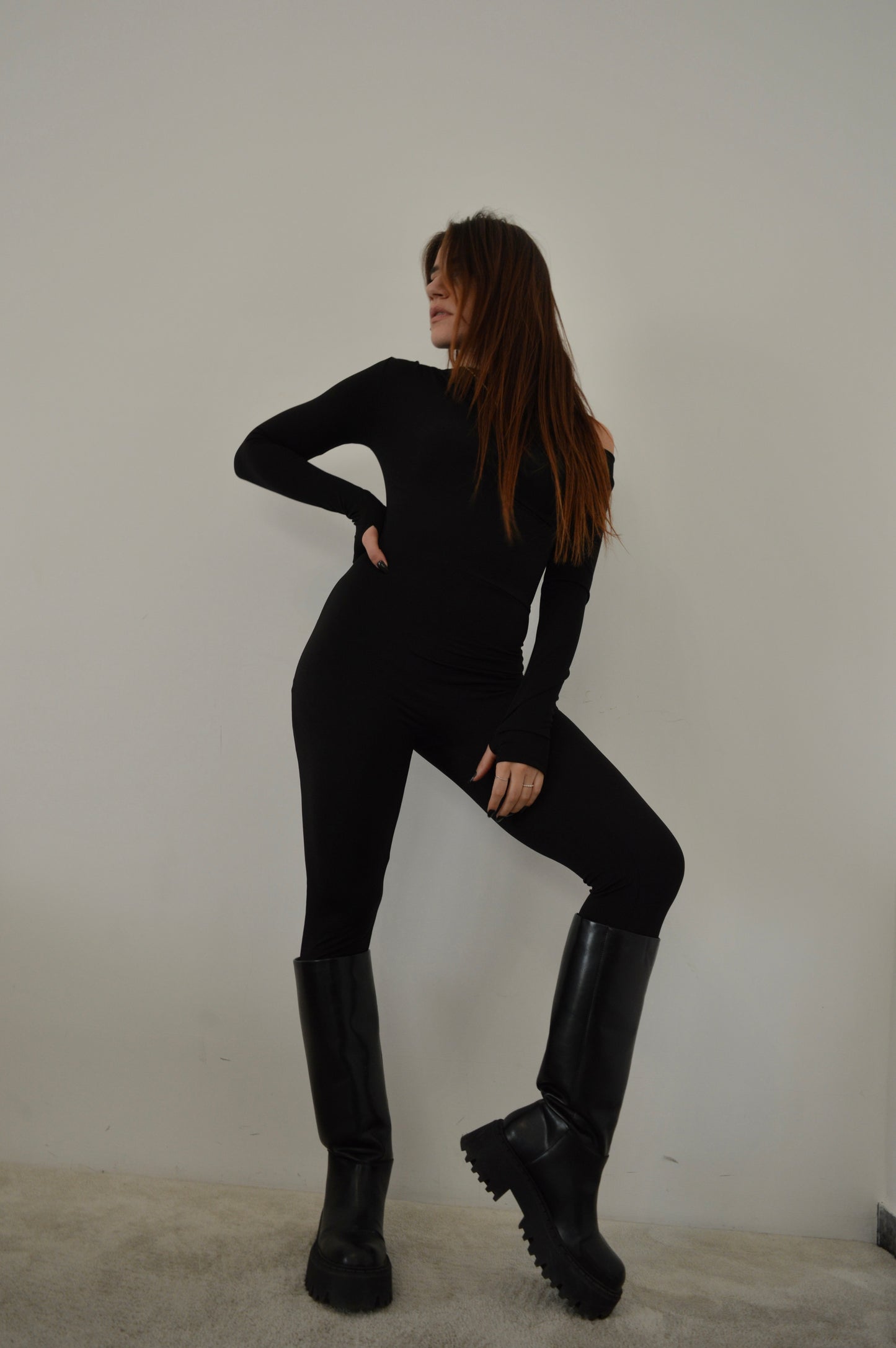 Tuta aderente con maniche lunghe